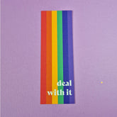 Bookmark with pride flag with text that reads 'deal with it'.
