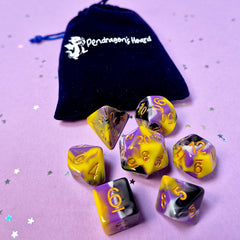 Set of non-binary: purple, yellow and white dice with a velvet blue drawstring bag. A great gift to play dungeon and dragons with or any other ttrpg.