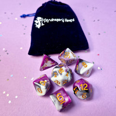 Set of asexual: purple,grey and white dice with a velvet blue drawstring bag. A great gift to play dungeon and dragons with or any other ttrpg.