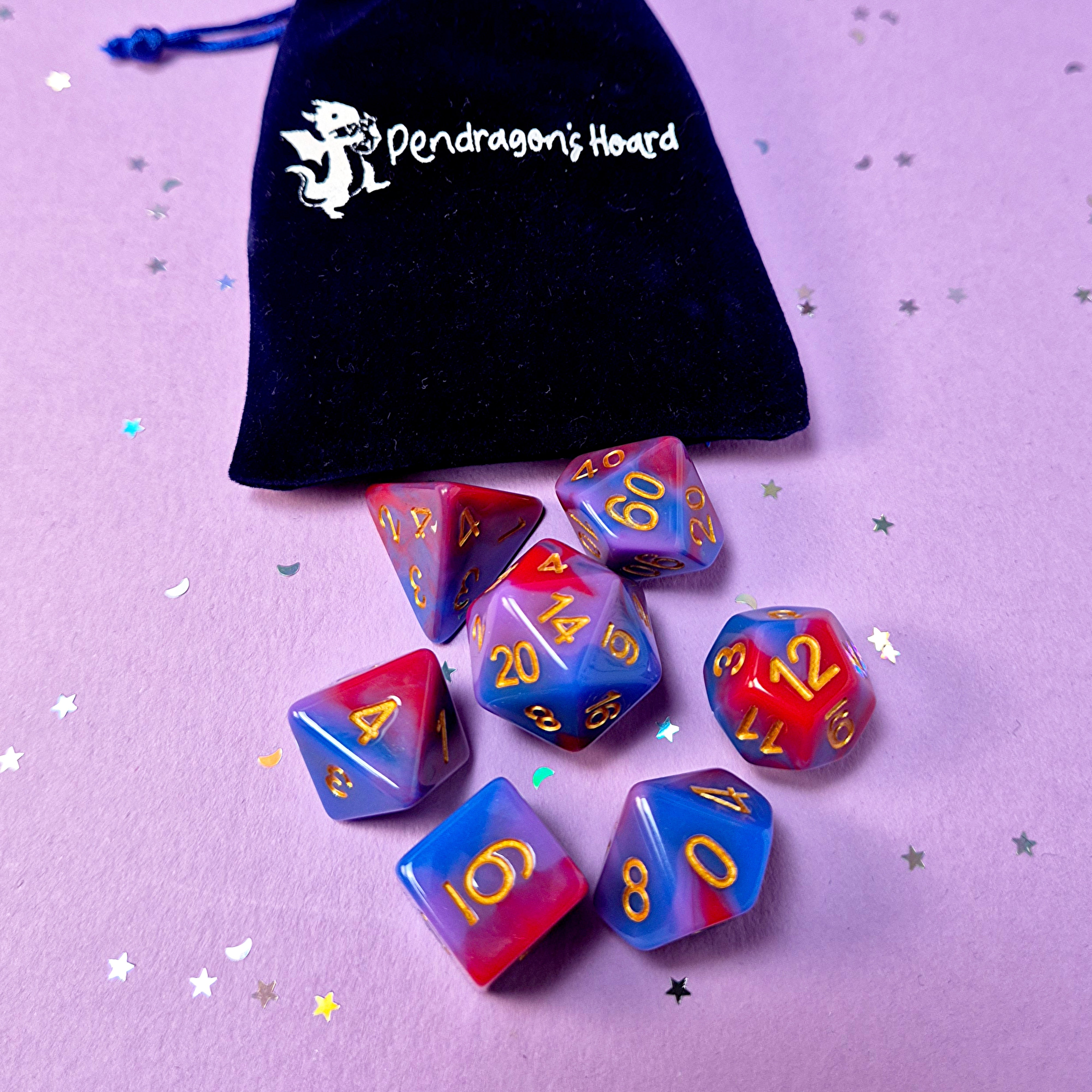 Set of bisexual: rose pink, purple and blue dice with a velvet blue drawstring bag. A great gift to play dungeon and dragons with or any other ttrpg.