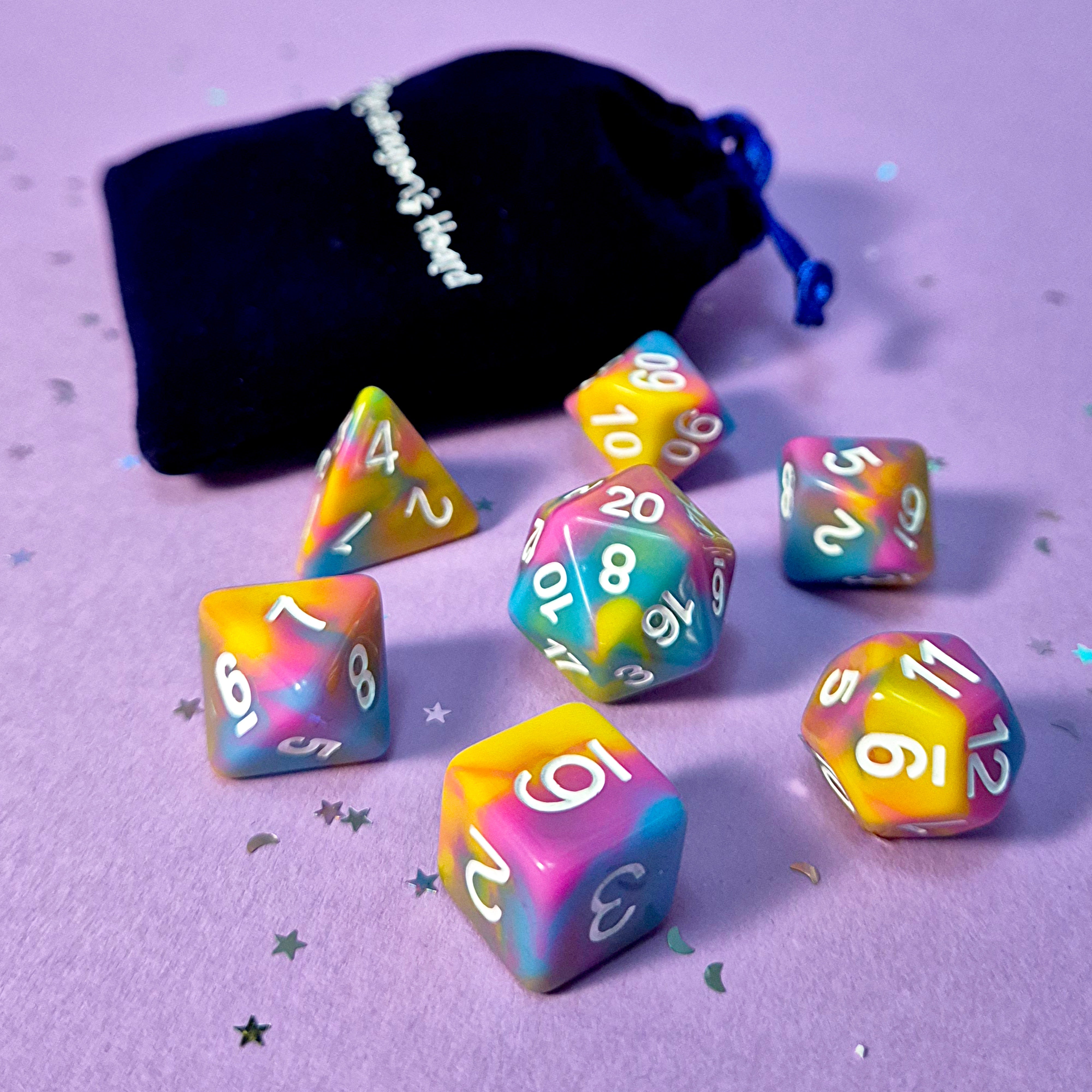 Set of pansexual: pink, yellow and blue dice with a velvet blue drawstring bag. A great gift to play dungeon and dragons with or any other ttrpg.
