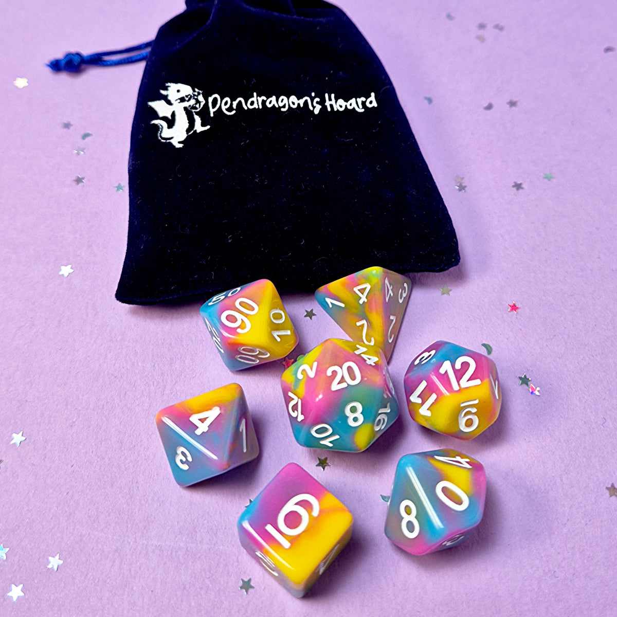 Set of pansexual: pink, yellow and blue dice with a velvet blue drawstring bag. A great gift to play dungeon and dragons with or any other ttrpg.