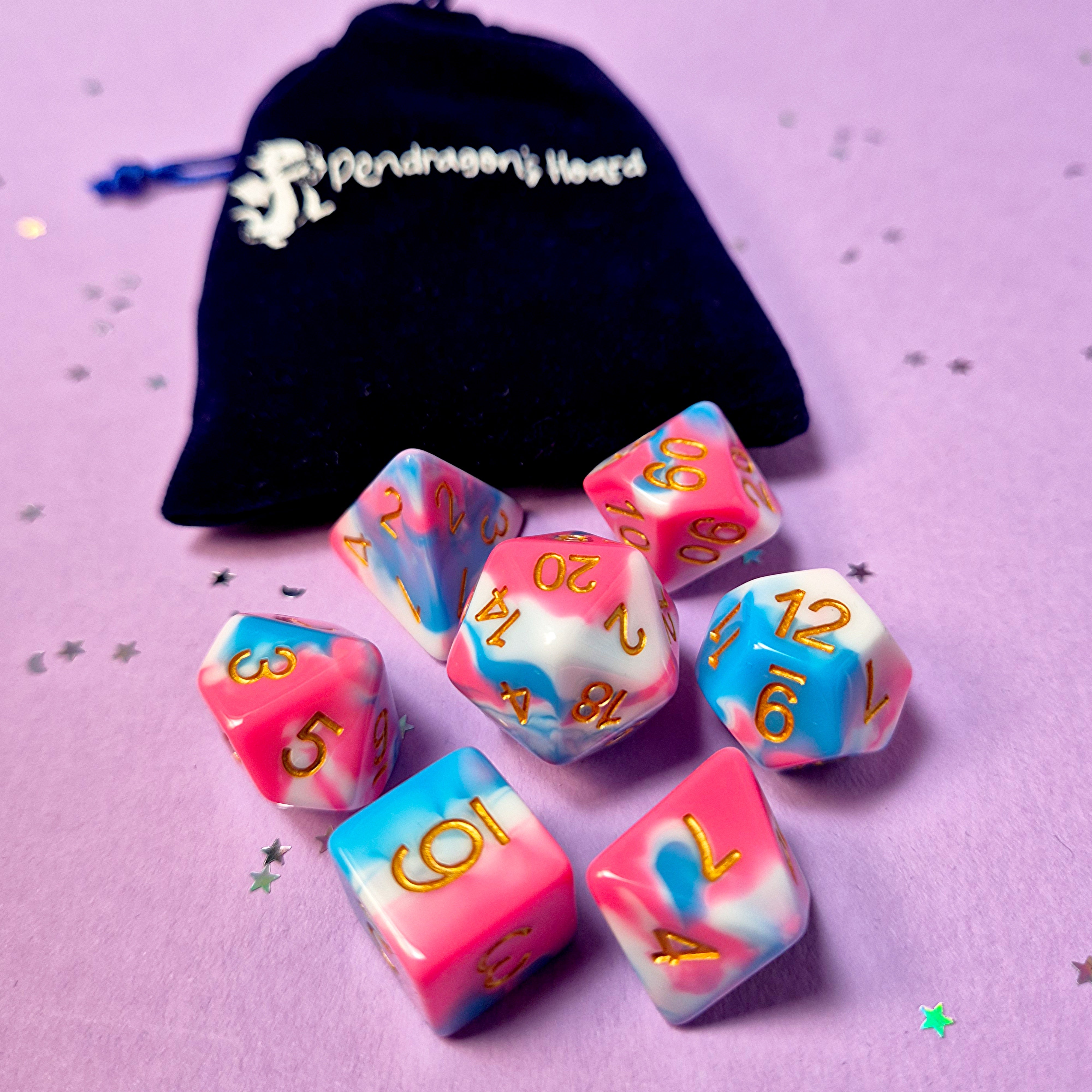 Set of transexual: pink, blue and white dice with a velvet blue drawstring bag. A great gift to play dungeon and dragons with or any other ttrpg.