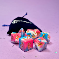 Set of transexual: pink, blue and white dice with a velvet blue drawstring bag. A great gift to play dungeon and dragons with or any other ttrpg.